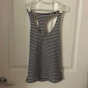 Lululemon tank top, black and white stripped with pink inside stitching, size 2